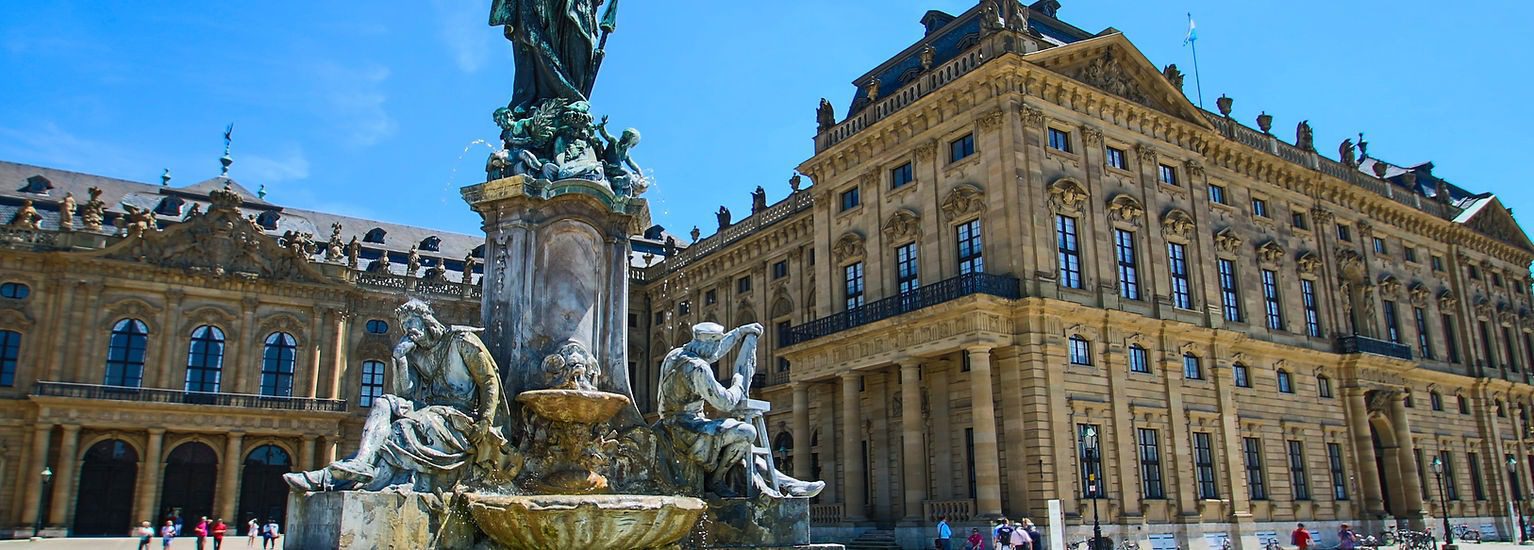 Romantic Road Würzburg Tours Würzburg Residence baroque palace exterior during a guided tour in Würzburg, Germany